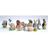 A collection of 11 Beswick Beatrix Potter figurines (af)