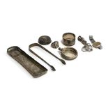 A small quantity of silver items, to include sugar tongs, fob watch case, etc, gr.wt. 6ozt