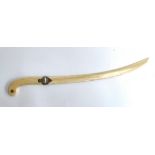 A long 19th century ivory letter opener, the curved 'blade', plated mount, with tripartite pistol