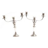 A pair of George III silver candlesticks, S C Younge & Co, Sheffield 1813, with Old Sheffield