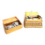 A wicker sewing box with contents, together with a small wooden box containing buttons