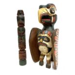 Two carved South American totems, one in the form of an eagle, 44cmH