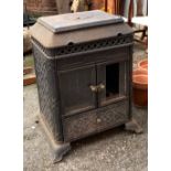 An Esse Bontesse multi-fuel stove, never used, with spare door glass