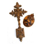 A carved wooden coptic cross, 42cmL; together with a tortoiseshell 'Seychelles Police Force' plaque,