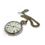 A silver open faced pocket watch by S Smith & Son, 'The Charing', the white enamel dial with Roman