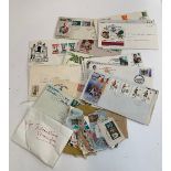 A quantity of first day covers and stamps