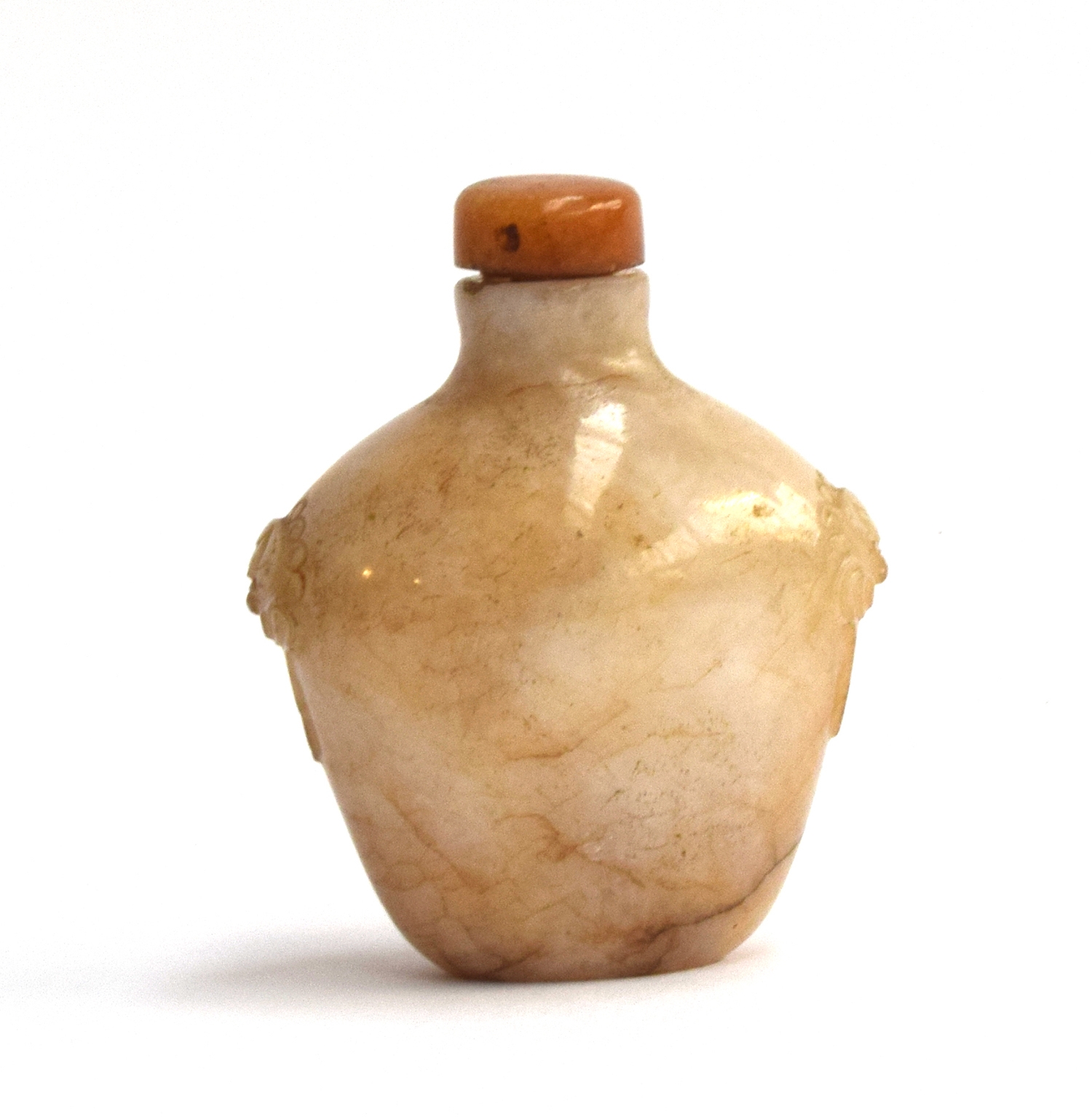 A Chinese white and russet jade snuff bottle, flattened ovoid form and carved mask handles, with - Image 2 of 2