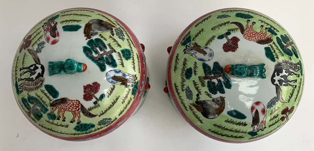 A pair of Chinese famille rose lidded pots depicting horses is a mountainous landscape, each with - Image 3 of 3