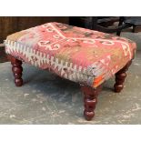 A kilim uphostsered footstool, 52x37x29cm