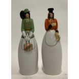 Two Roby Paris ceramic bottles each in the form of ladies in formal dress, each approx. 30cmH, one