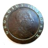 A 1797 George III penny, with 11 leaves