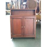 A mahogany wall hanging cupboard, having two shelves, 58x12x71cmH