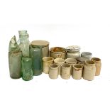 A small lot of various vintage stone ware jars, together with glass bottles including Crewkerne