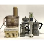 A magimix food processor, several french press coffee pots, mocha pot, braun soup food processor