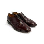 A pair of gents brown leather brogues by Loake, size 11, together with a pair of gents black leather