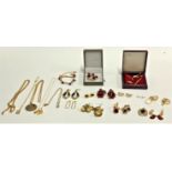 A mixed lot of gold tone jewellery to include necklaces, half penny 1957 necklace;