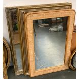 Two gilt framed rectangular wall mirrors, 85x70cm and 85x60cm; together with one other in bamboo