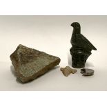 A fossilised tigers tooth; ammonite; and soapstone carved dove etc