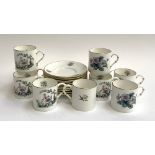 A Royal Worcester coffee set comprising coffee cans (10) and saucers (11) (2 patterns)