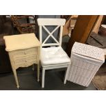 A white wicker laundry basket, white painted chair with loose cushion and bedside cabinet (3)