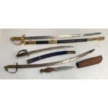 A replica naval officer's sword, with gothic hilt; together with three other replica blades