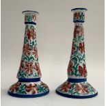 A pair of majolica candlestick holders, signed Porches Algarve, each approx. 28cmH