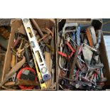 Two mixed boxes of hand tools, to include saws, planes, drills, levels, etc