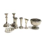 A mixed lot of plated wares, to include a pair of candlesticks, pair of spill vases, candleholder,