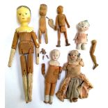 A mixed lot of dolls (all af) to include Dutch wooden peg doll; Japanese bisque head dolls etc