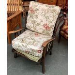 An Ercol stickback open armchair, with cushions, 81cmW