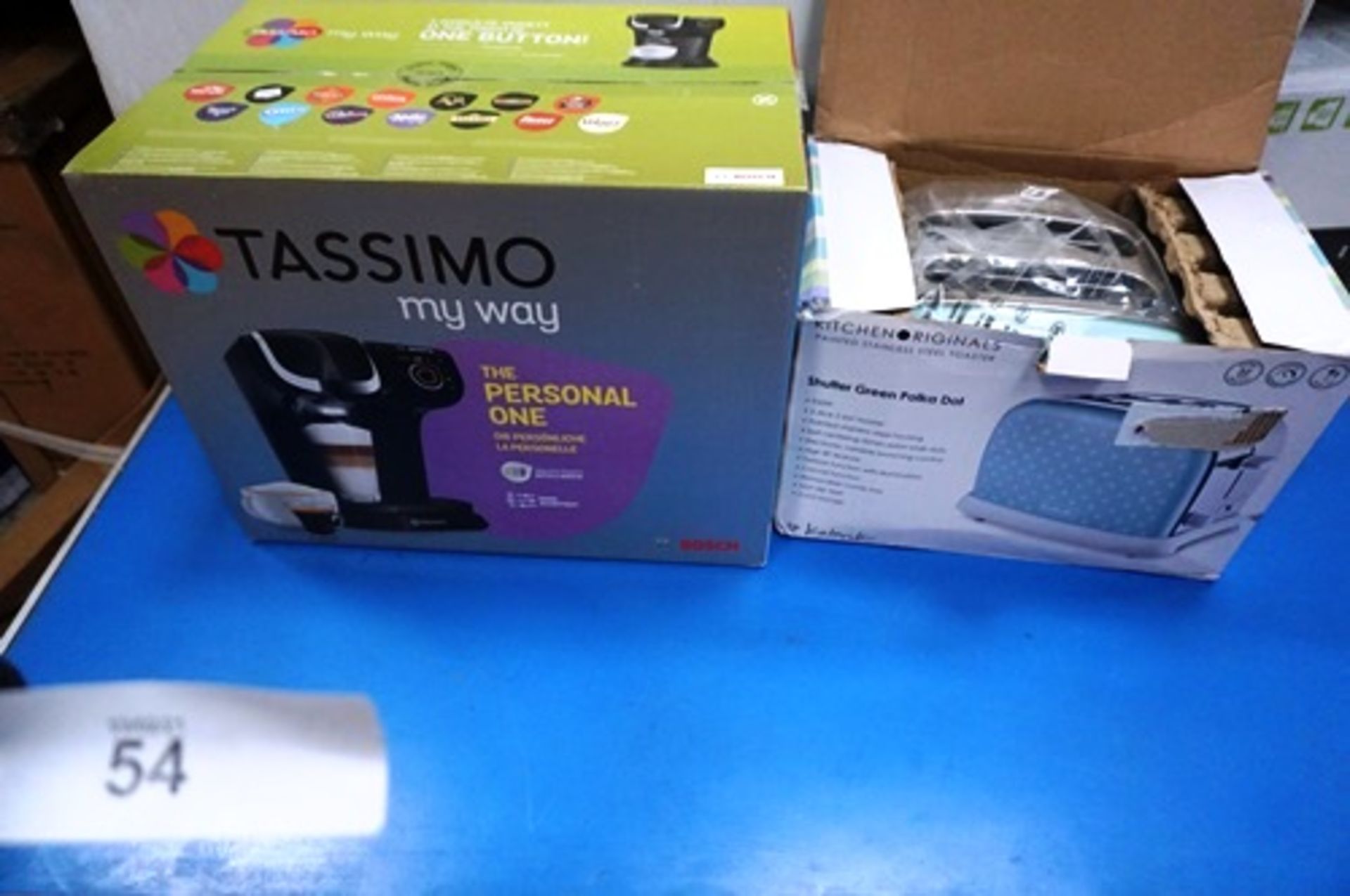 A Tassimo coffee machine, model TAS6002GB together with Polka Dot green 2 slice toaster, model 47334