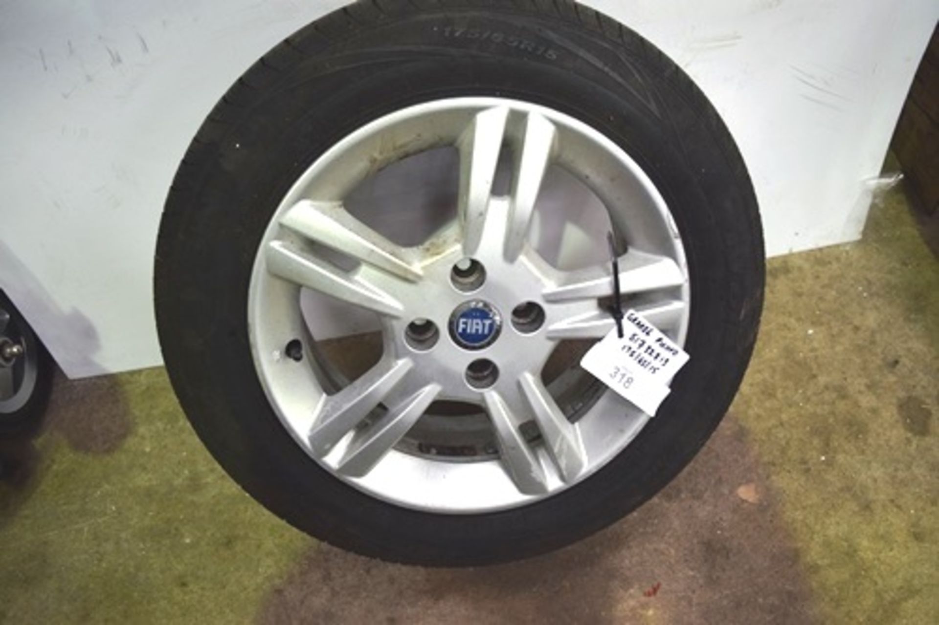 1 x Mazda 4 stud alloy wheel and 1 x Fiat 4 stud alloy wheel, both with fitted tyres - Second-