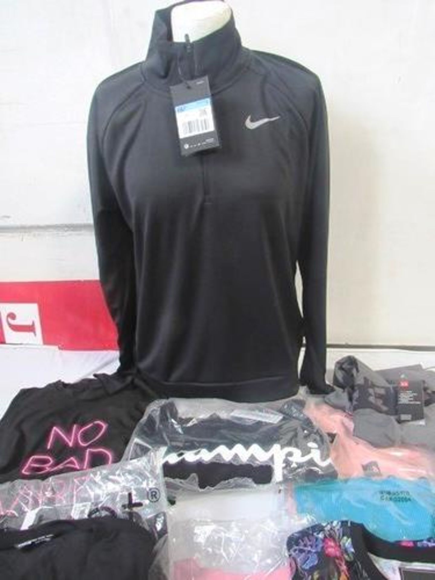 A small quantity of adult t-shirts and tops including Sportswear Nike, Superdry, Under Armour, North - Image 2 of 3