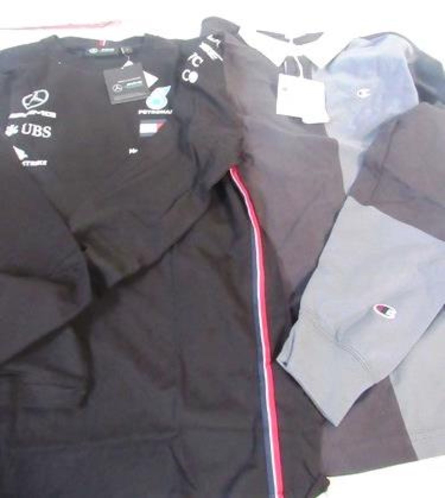 1 x Official AMG Petronas long sleeve top, size large and 1 x Champion long sleeve top, size M - New