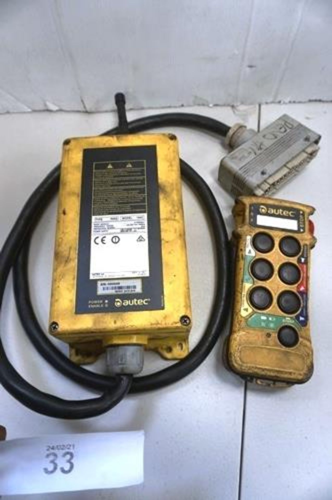 An Autec radio remote control unit, comprises receiver unit, controller, no battery, untested -