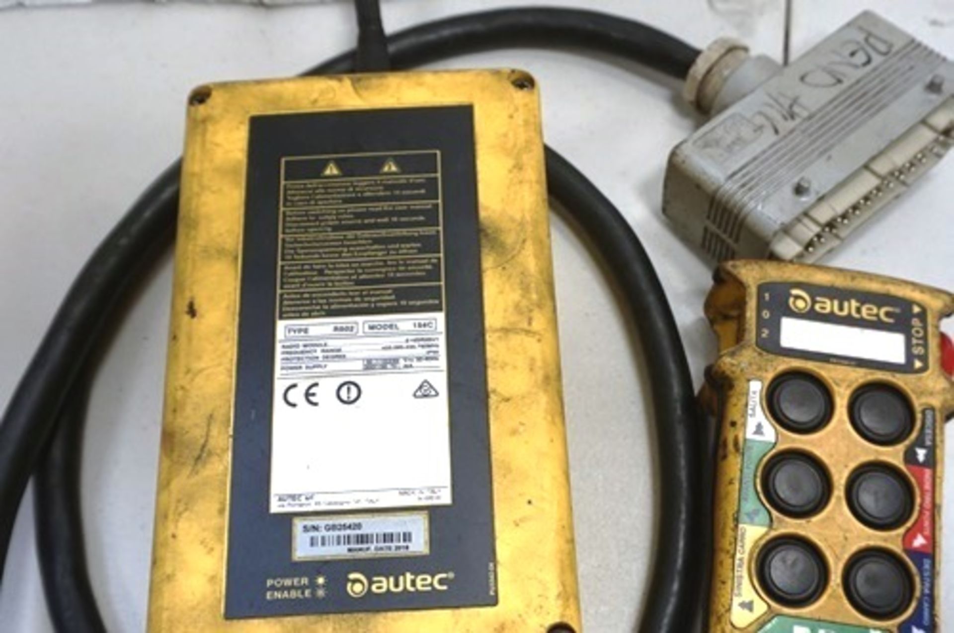 An Autec radio remote control unit, comprises receiver unit, controller, no battery, untested - - Image 2 of 5