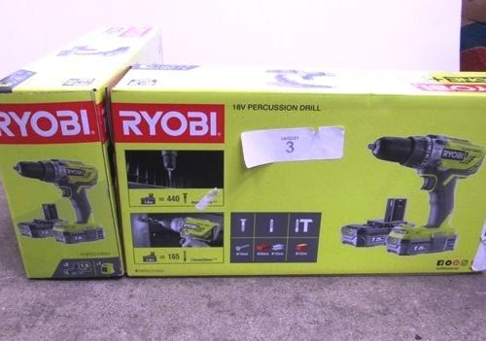 2 x Ryobi 18V percussion cordless drill sets each comprising 1 x drill, 2 x 1.5Ah batteries and 1