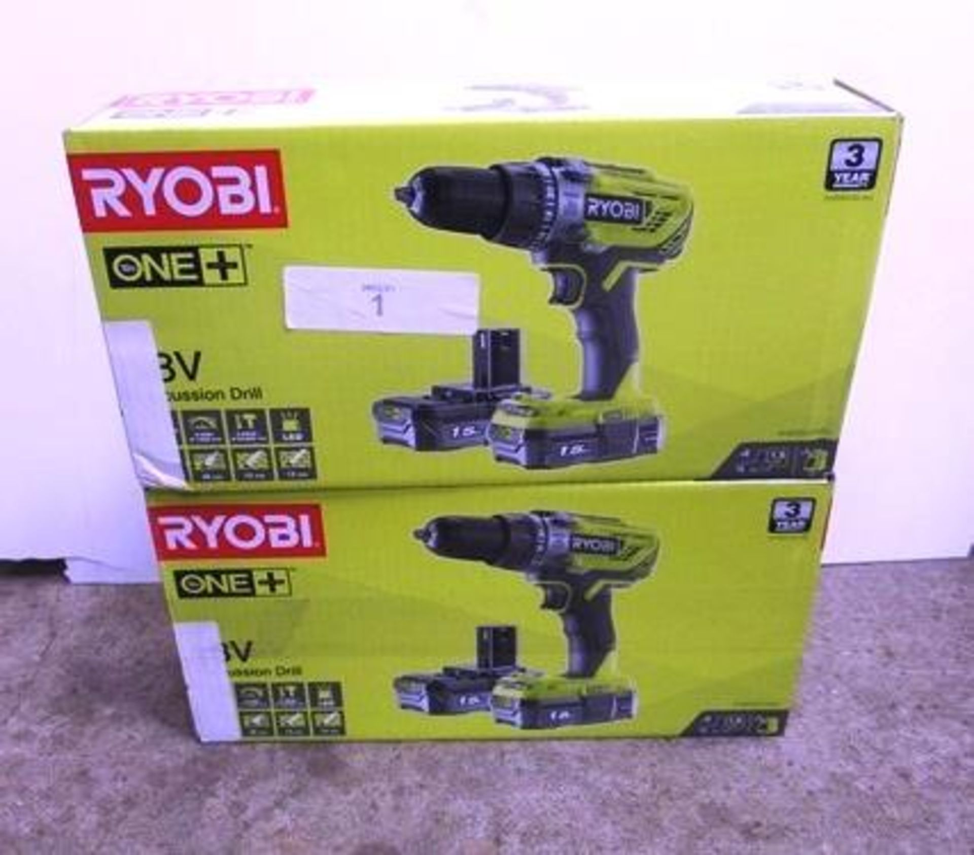 2 x Ryobi 18V percussion cordless drill sets each comprising 1 x drill, 2 x 1.5Ah batteries and 1