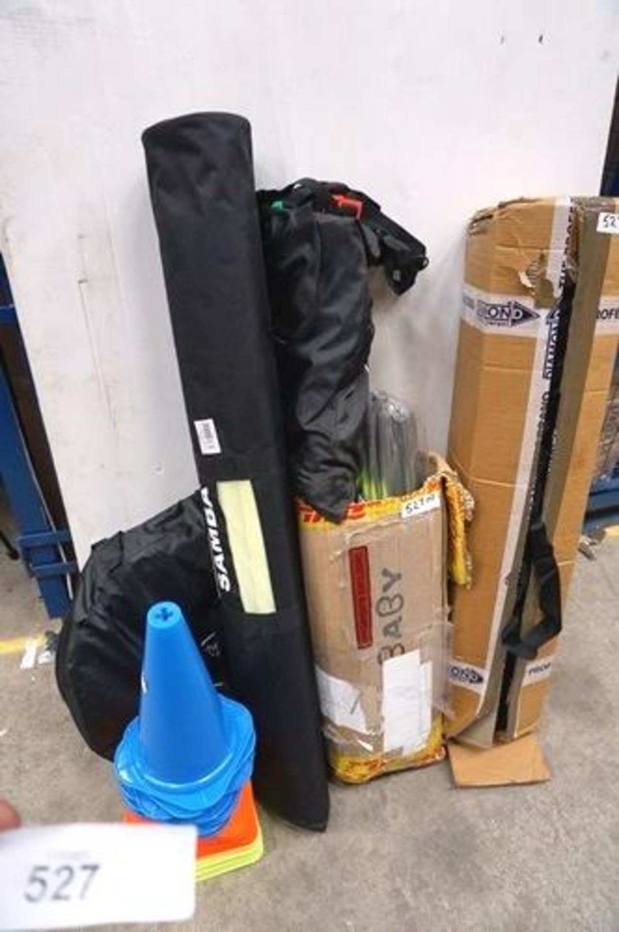 A selection of football training equipment including Diamond 12" traffic cones, The Soccer Store