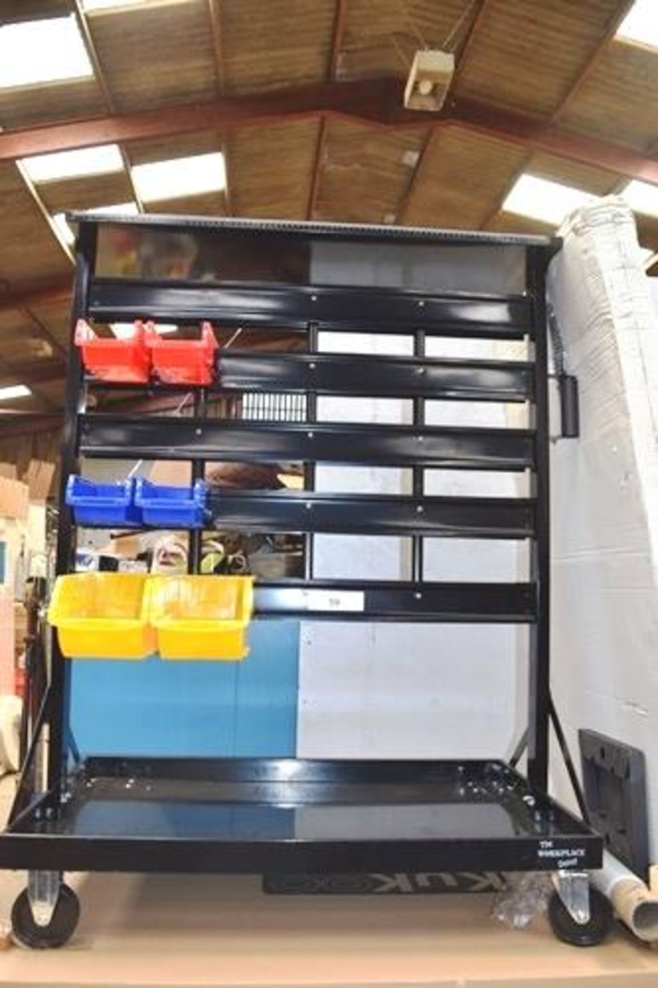The Workplace mobile double sided small part bin trolley with 32 x blue bins, 32 x red bins and 10 x