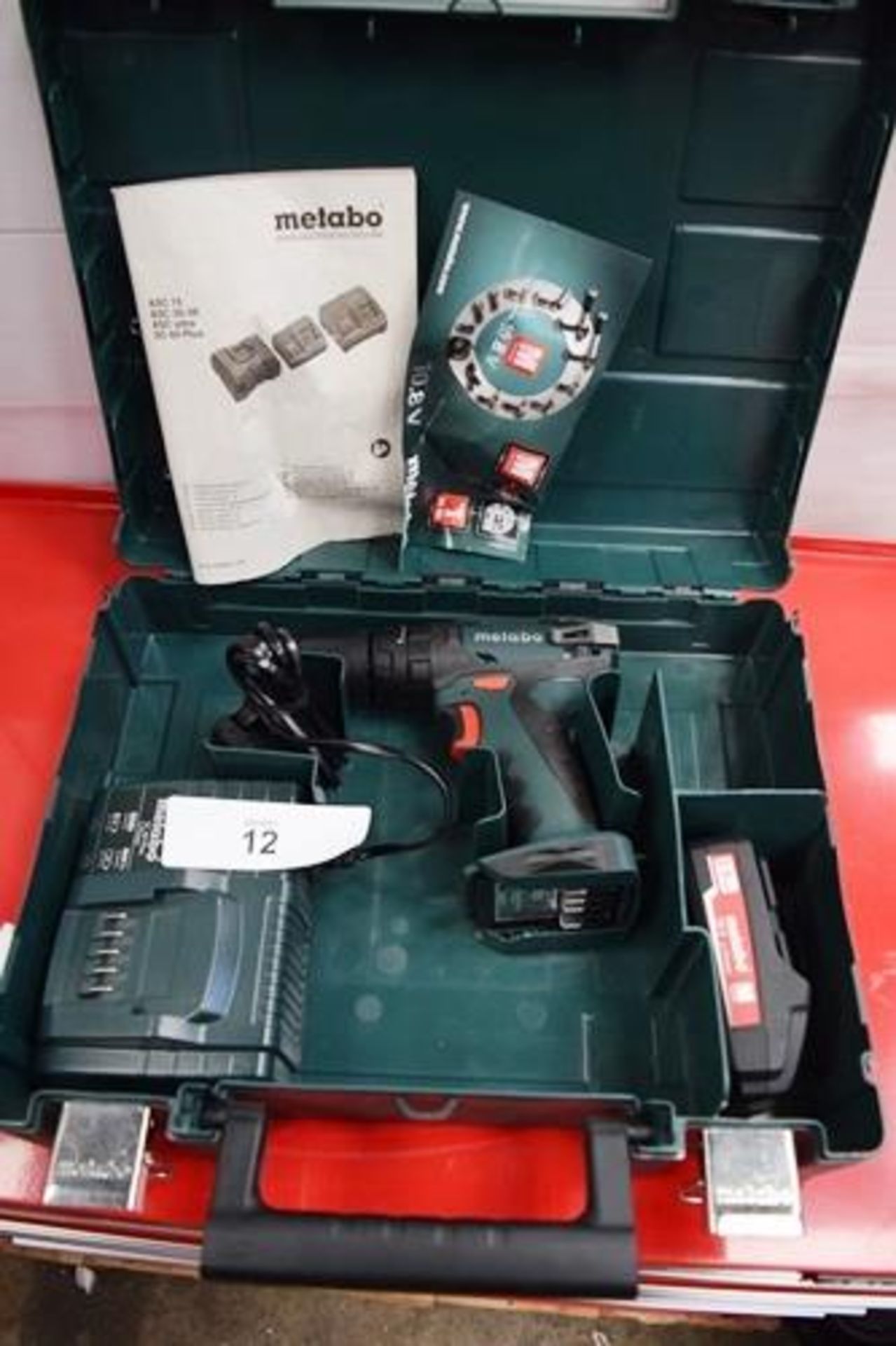 1 x Metabo 18V cordless drill, model SB18 + SC60 Plus, with 1 x 18V 2.0Ah battery, charger, manual