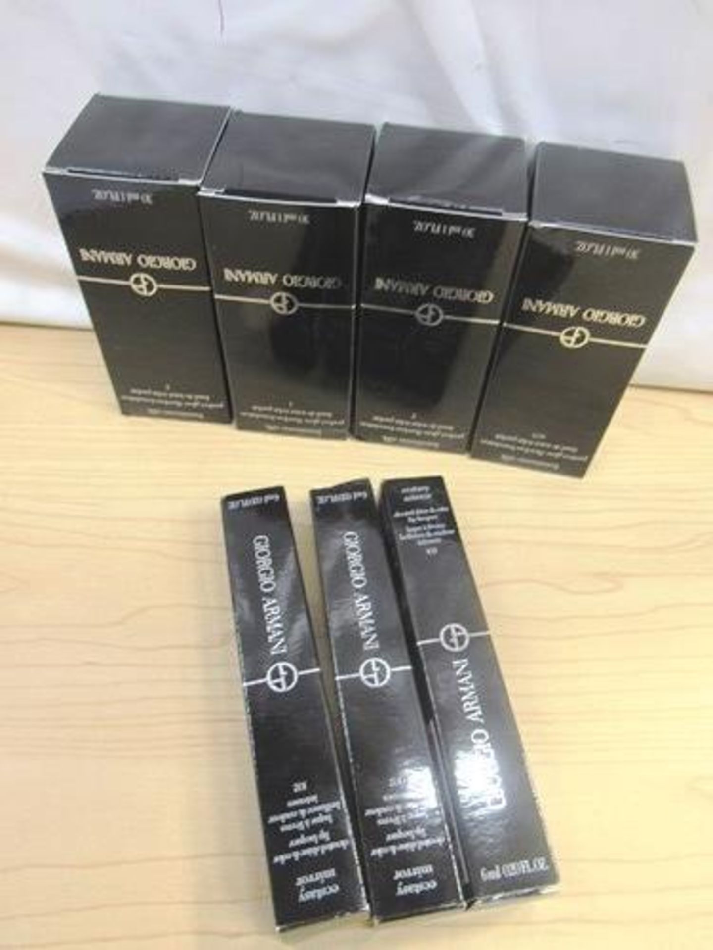 4 x 30ml Giorgio Armani luminous silk foundations, No. 2, 4 and 8.75 and 3 x Armani lip lacquer