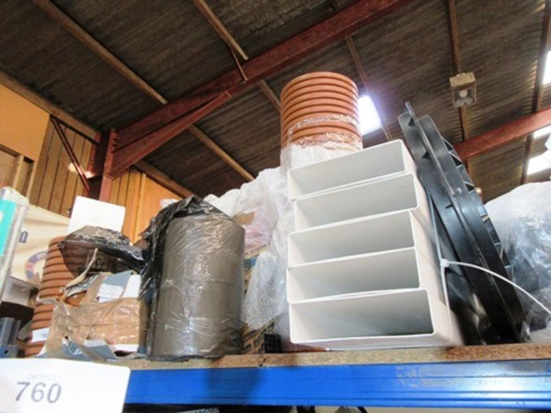 A selection of plumbing and draining equipment including Ekodrain elbows, Timloc plastic air bricks,