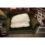 A late Victorian green upholstered drop end settee
