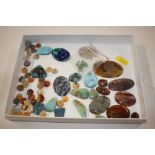 A tray of hard stone and turquoise mounts etc.