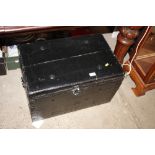 A painted travelling trunk fitted carrying handles