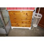 A pine chest fitted four drawers