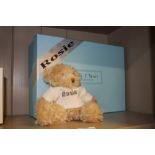 A boxed Rosy Bear with shawl