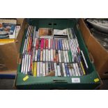 A box of CDs and tape cassettes