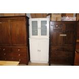 A vintage painted kitchen dresser